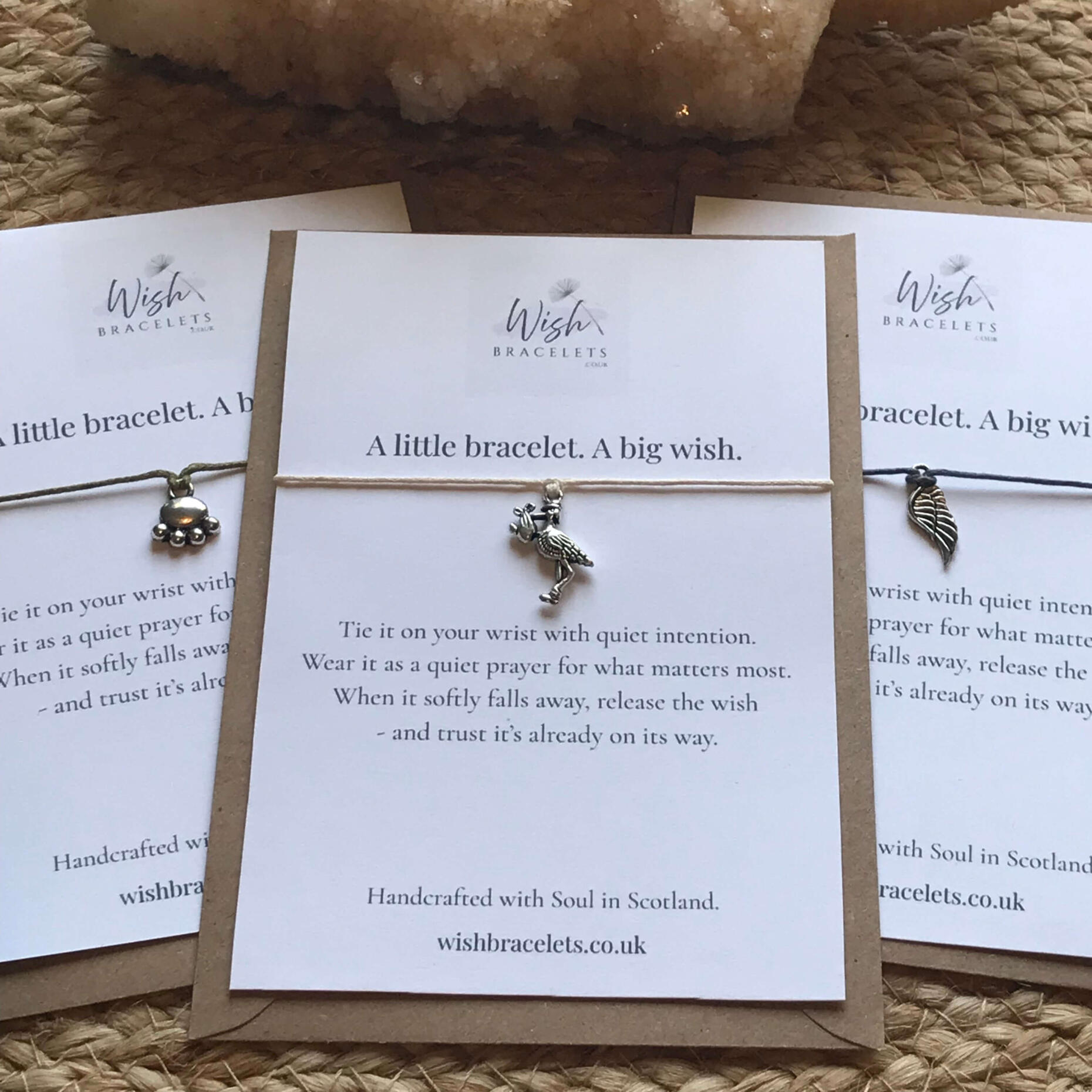wish bracelets collection three wish bracelets with Tibetan silver charms on wish cards