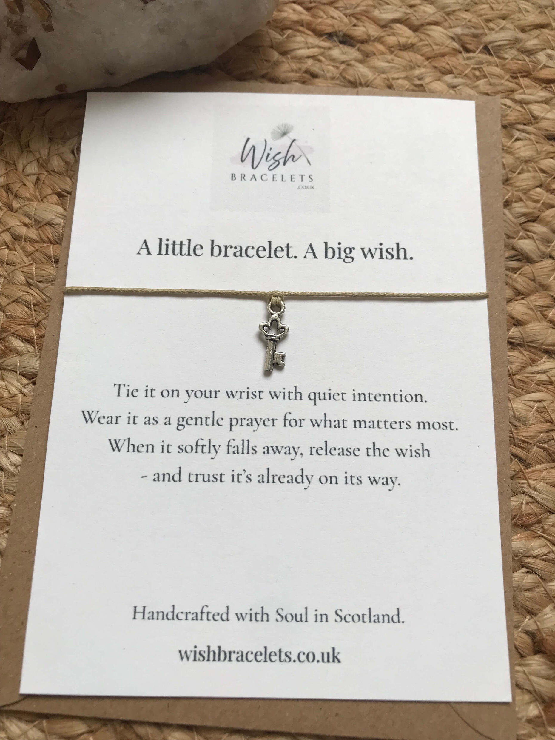 New Beginnings Wish Bracelet new beginnings wish bracelet with key charm and soft beige cord