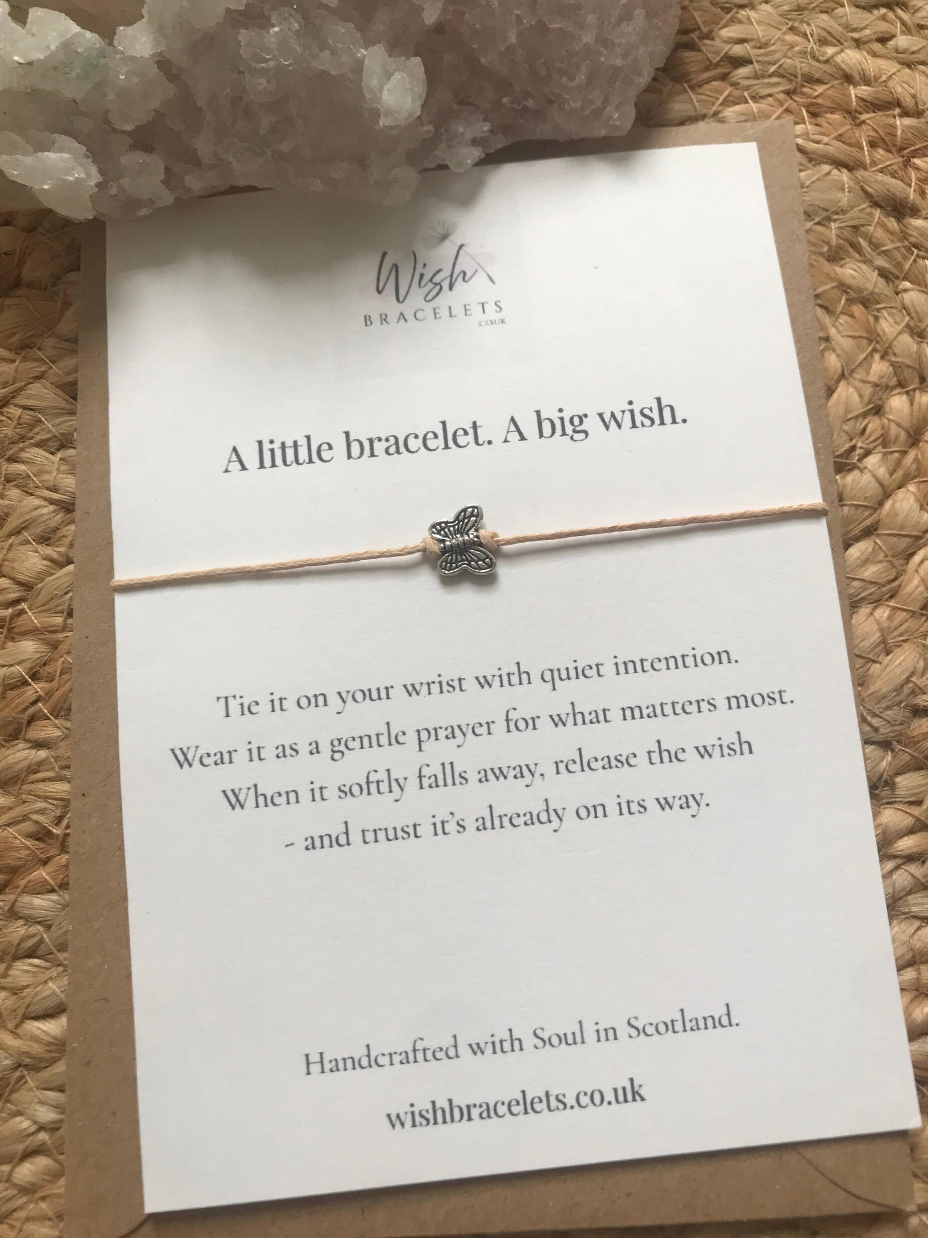 Metamorphosis Wish Bracelet butterfly wish bracelet with caramel cord on a wish card with crystal