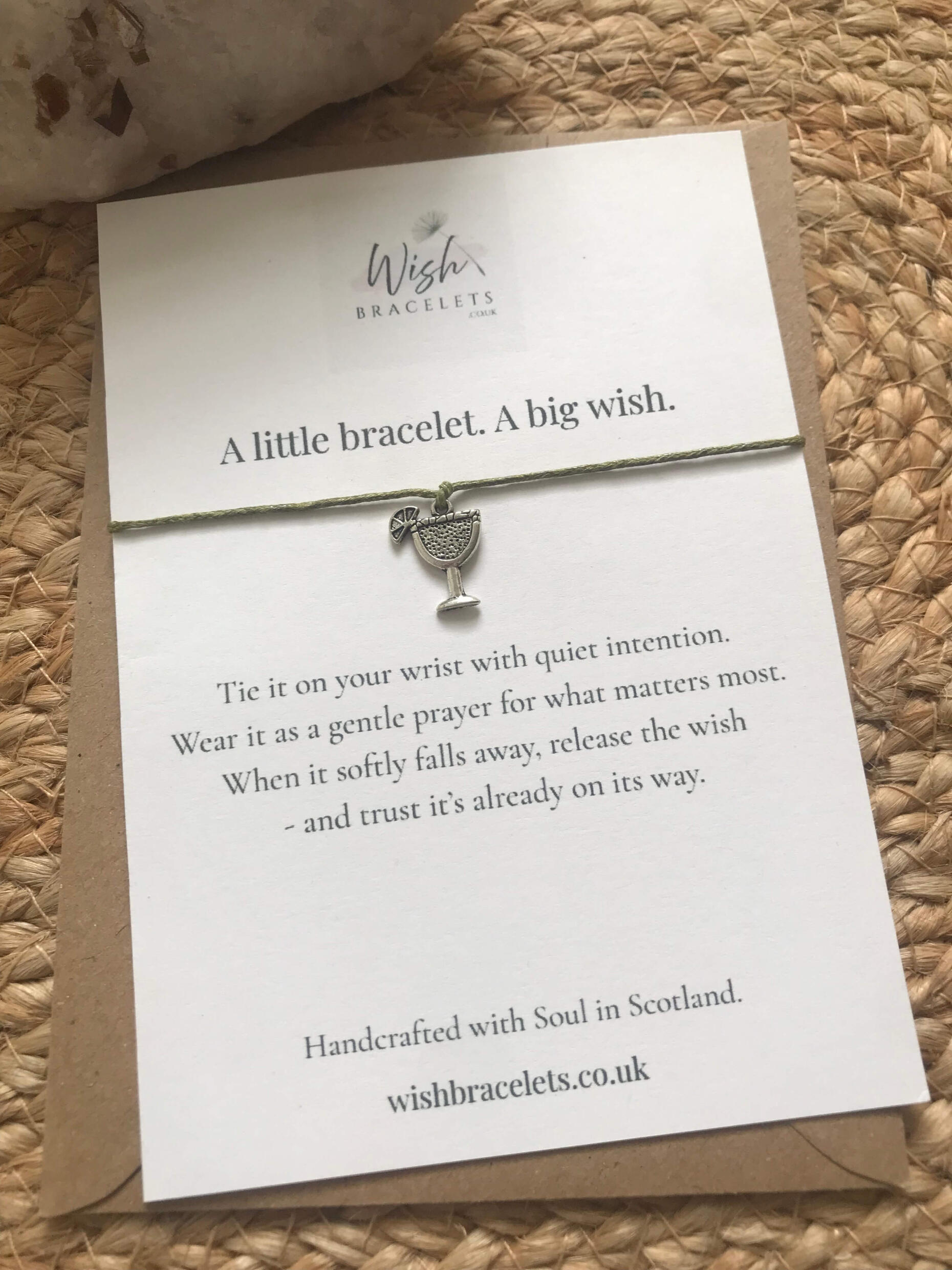 Celebration Wish Bracelet cocktail celebration wish bracelet with olive green cord on a wish card with crystal